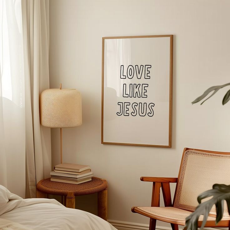 a bedroom with a poster on the wall next to a chair and table in front of it