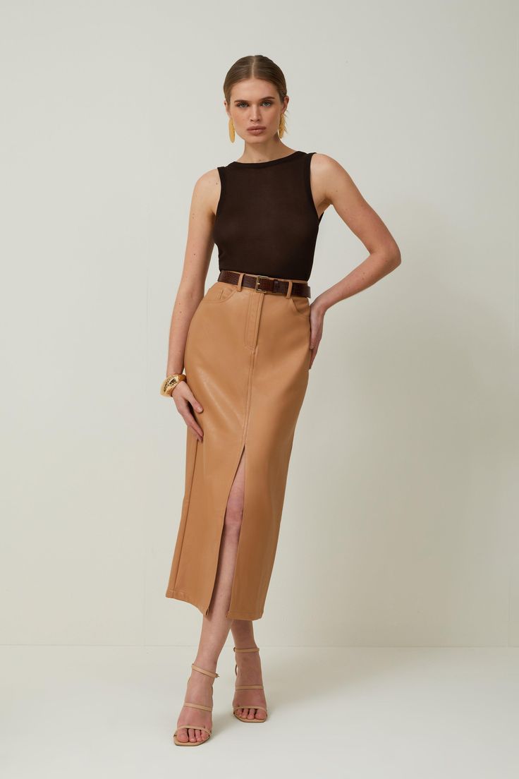 Allow This Closet Staple To Provide An Instant Update To Everyday Rotations. Crafted With Premium Leather, This Midi Skirt Emsuspenders An Off-Duty Aesthetic, While Corset-Style Seaming Adds Dimension To The Piece. Belt Loops And Lapels Add Understated Detailing This Piece. Style This Skirt With Heels And A Crop Top To Exude Understated Elegance At Your Next Event.Midi Hemlineleatherfront Leg Slitzip Fastening Bodycon Skirt Midi, High Pencil Skirt, Mid Length Skirt Classy, Fall Pencil Skirts, Leather Pencil Skirt Midi, Camel Leather Pencil Skirt, Pencil Skirt Heeled Boots, Lined Pencil Skirt, Turtle Neck Pencil Skirt