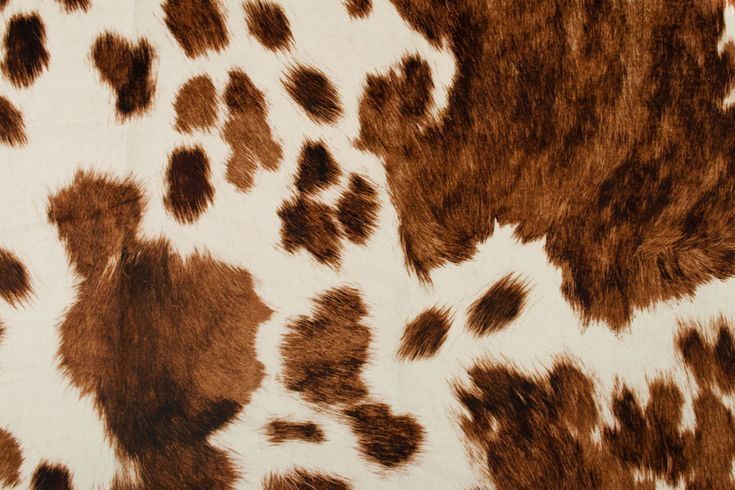 the animal print is brown and white