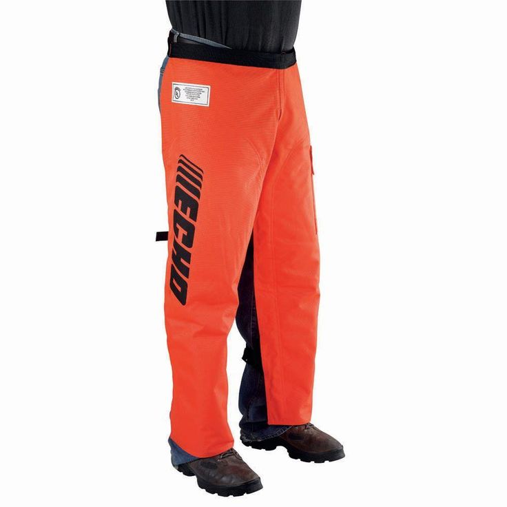 an orange snowboard pants with black and white logo on the bottom, in front of a white background