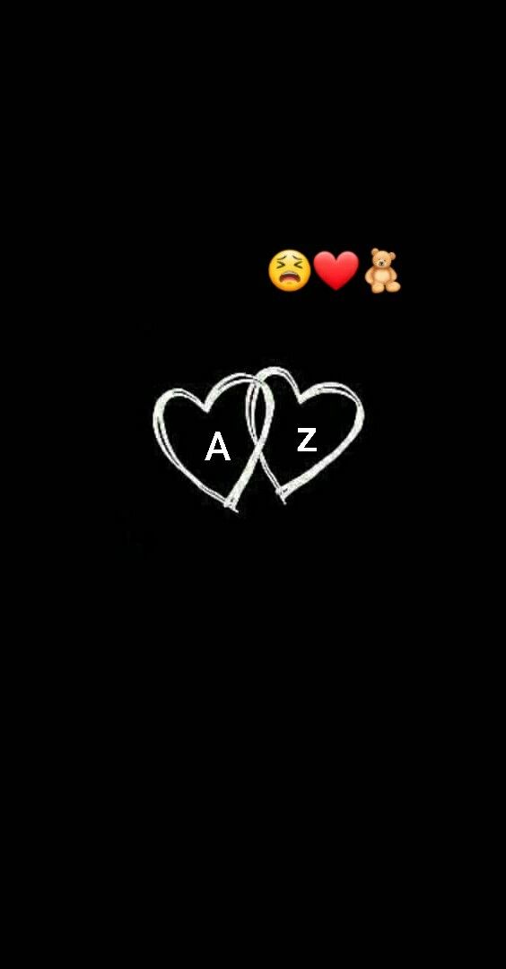 two hearts with the letters i love you and an emoticive smiley face in the middle