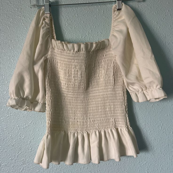 Size Large. Never Worn. Beige Stretch Summer Blouse, Beige Stretch Blouse For Summer, Summer Beige Tops For Daytime, Beige Tops For Daytime Summer, Fitted Beige Summer Tops, Beige Tops For Daytime Summer Wear, Fitted Beige Blouse For Summer, Spring Stretch Off White Tops, Off White Stretch Tops For Spring