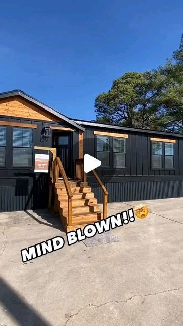 a mobile home with the words mind blown on it's front door and stairs