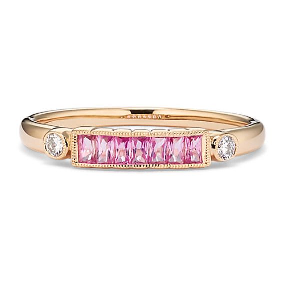 Two natural diamond accents bookend a stunning channel of baguette natural pink sapphires in this unique design. Crafted in warm 14-karat yellow gold  this stackable ring features delicate milgrain detail throughout for a touch of vintage flair. Pink Sapphire Diamond Ring, Step Kids, Sapphire Diamond Ring, Unique Ring, Stackable Ring, Natural Sapphire, Sapphire Diamond, Stackable Rings, Pink Sapphire