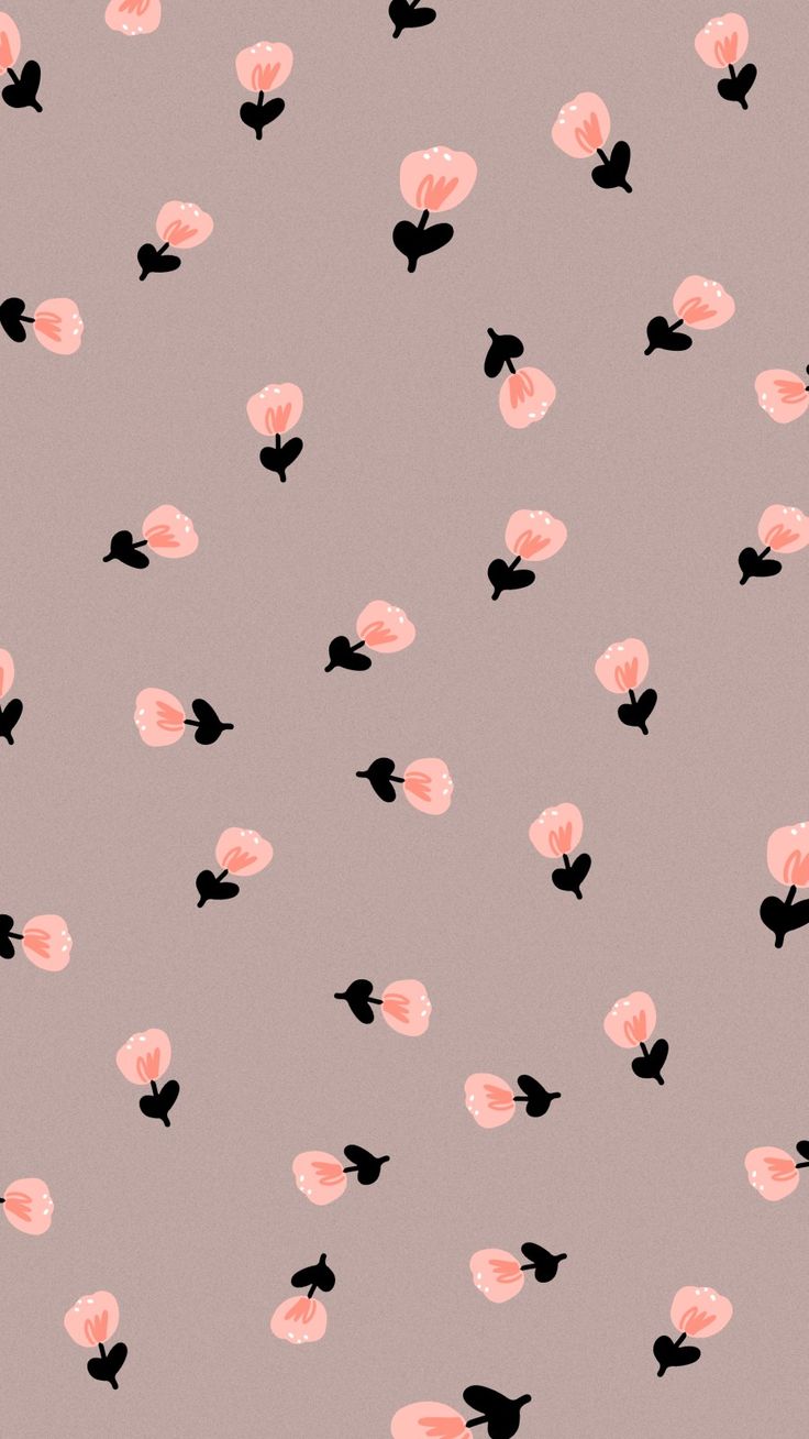 pink and black flowers are flying in the air on a light gray background with dark shadows