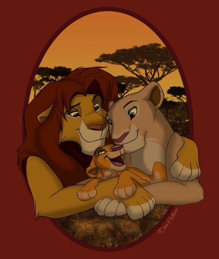 the lion and cub are hugging each other