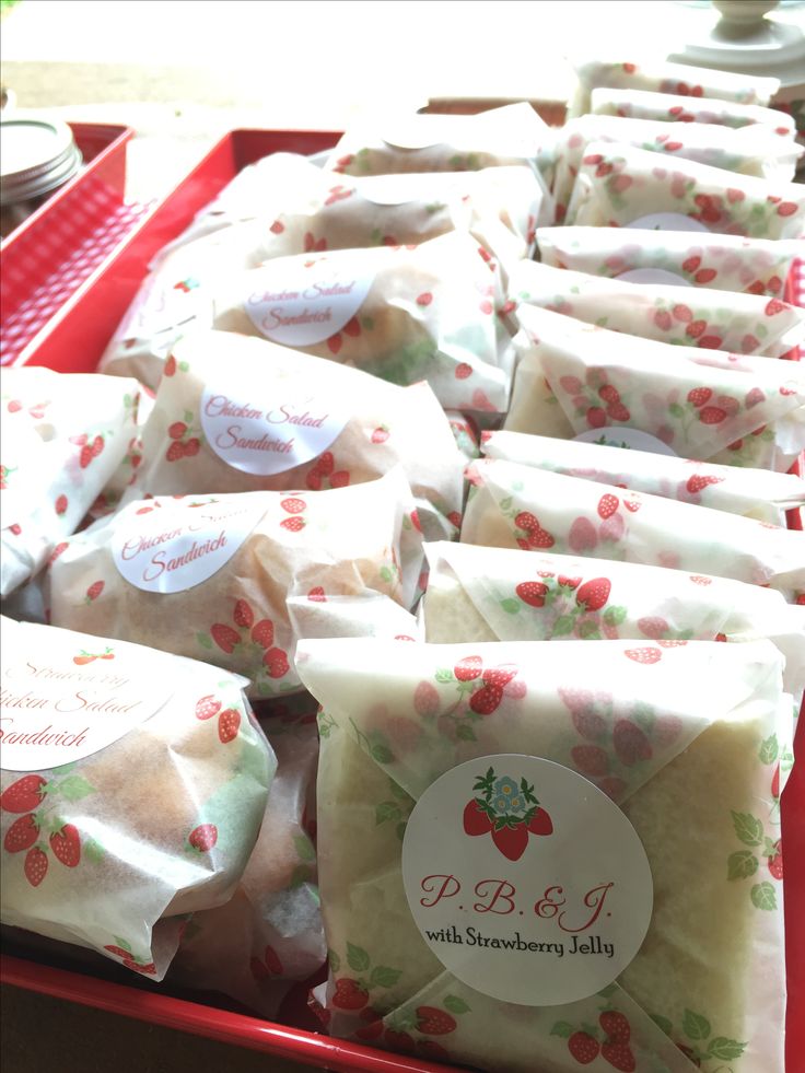 many bags of soap sitting on top of a red tray