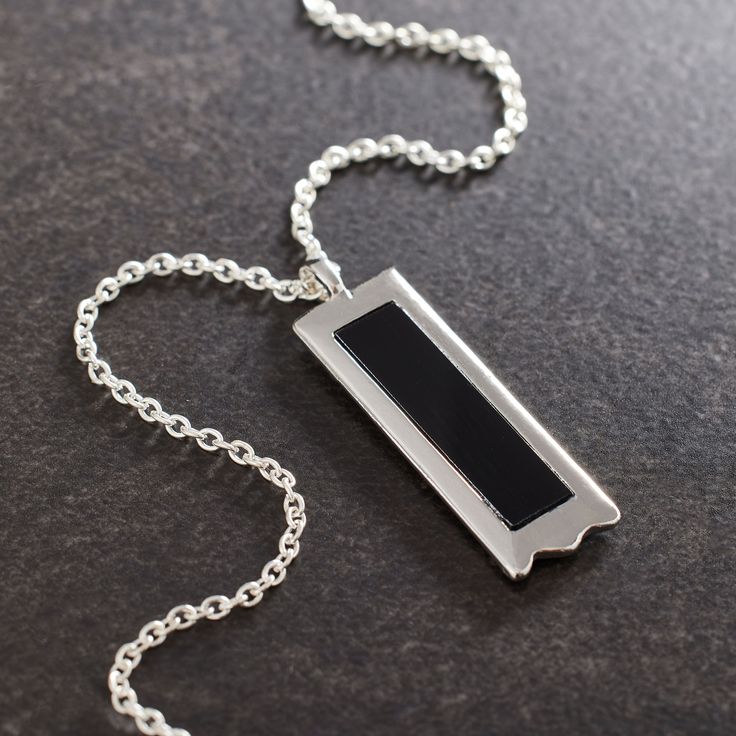 Find the Silver & Black Rectangle Pendant by Bead Landing™ at Michaels. Add eye-catching style to a handcrafted necklace with this pendant from Bead Landing. A black rectangle in a silver setting, this pendant will make a striking piece on its own or paired with complementary stones and charms on a simple chain. Add eye-catching style to a handcrafted necklace with this pendant from Bead Landing. A black rectangle in a silver setting, this pendant will make a striking piece on its own or paired Modern Black Necklaces For Everyday Use, Modern Black Necklace For Everyday Use, Modern Black Necklace For Everyday, Modern Black Necklace With Large Pendant, Black Pendant Necklace For Everyday Use, Elegant Rectangular Necklace For Everyday Use, Rectangular Black Jewelry For Everyday Wear, Black Rectangular Jewelry For Everyday Wear, Elegant Black Rectangular Necklace