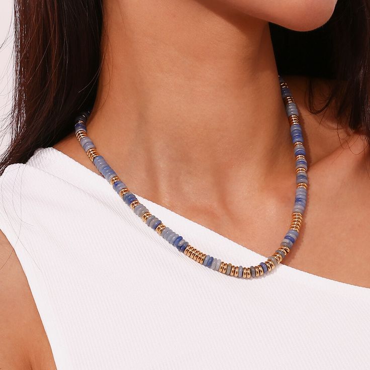 Add some playful bohemian vibes to your outfit with our Gemstone Rondelle Beaded Gold Necklace. Choose your favorite gemstone for a unique and ethnic touch. Perfect for everyday wear or special occasions. (Boho-chic never looked so good!) DETAILS & SIZE Finish: 18K gold plate Material: Stainless Steel, Gemstone Measurements: Beads: approx. 6.5mm; Chain: 18" + 2" extension Lobster Claw clasp Waterproof, tarnish-resistant, and nickel free Shop Necklaces for more options to layer with this! Casual Festival Jewelry With Large Beads, Casual Large Beads Jewelry For Festival, Bohemian Hand-strung Beaded Necklaces For Beach, Bohemian Wooden Beaded Necklaces For Vacation, Casual Beaded Jewelry For Festivals, Vacation Heishi Beaded Necklaces, Bohemian Heishi Beads Necklaces For Beach, Adjustable Bohemian Beaded Necklace With Colorful Beads, Vacation Beaded Heishi Necklaces