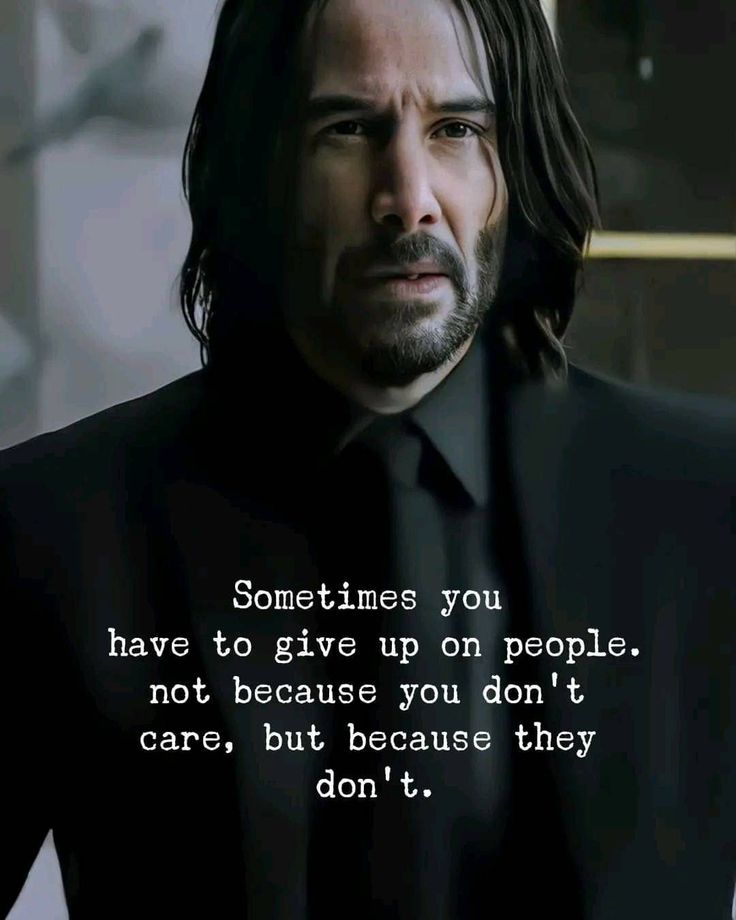 a man in a suit and tie with a quote about something you have to give up on people not because you don't care, but because they don't