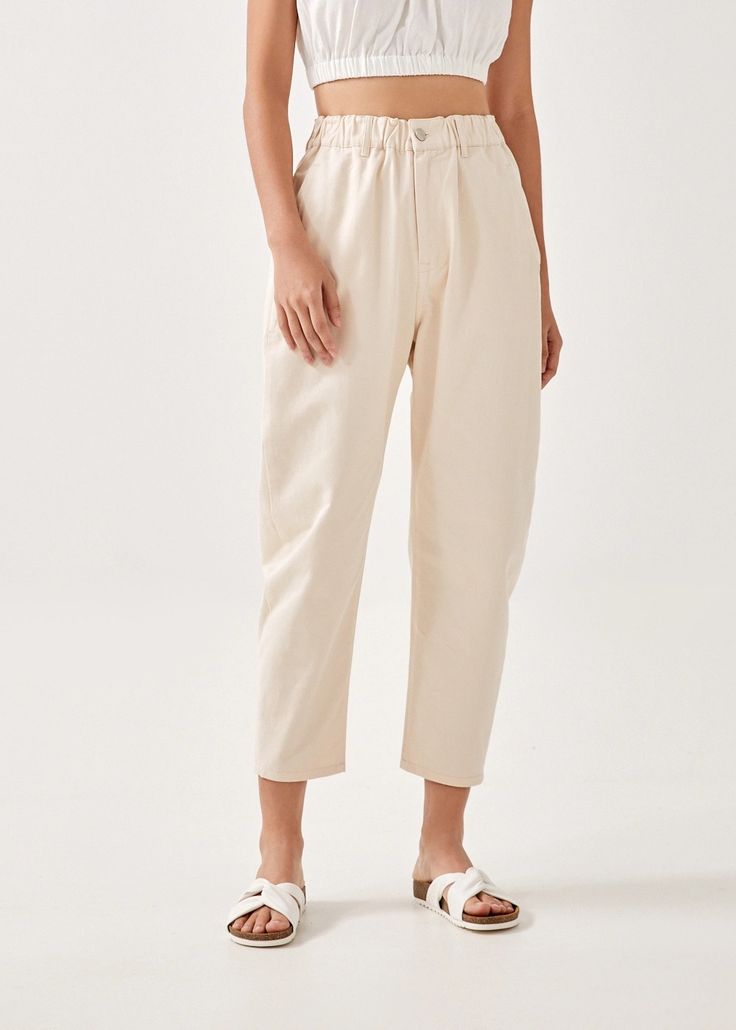 Paladia Elastic Waist Pants | Love, Bonito US Relaxed Fit Bottoms With Elastic Waistband And Tapered Leg, Relaxed Fit High-waisted Bottoms With Elastic Waistband, Relaxed Fit High-waisted Pants With Elastic Waistband, Chic Everyday Bottoms For Spring, Everyday Ankle-length Tapered Bottoms, Chic Ankle-length Cotton Bottoms, Everyday Tapered Pants With Elastic Waistband, Spring Cotton Sweatpants For Day Out, High Waist Pull-on Pants For Everyday