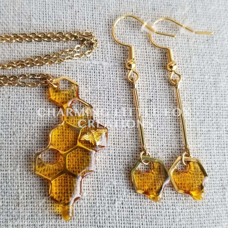 I'm now using these pretty golden bars to hang the little honeycombs from. These earrings are made with resin and materials from Japan, resulting in a totally unique and exciting way to to share my love for the bees! I seriously considered becoming a beekeeper at one point... ha! Please keep in mind that each piece is handmade and may differ slightly. Though my jewelry is tough and reinforced, I do not recommend wearing in the shower or swimming. ♥ Please note that monitor settings can differ, a Bee Inspired Jewelry, Non Piercing Earrings, Weird Earrings Aesthetic, Cool Earrings Unique, Things To Make With Resin, Dripping Honeycomb, Honey Earrings, Concert Jewelry, Honeycomb Earrings