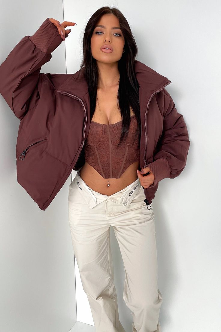 Keepin' you cozy this winter! The Ajax Puffer offers a super soft and comfy puffer material, long sleeves with cuffed ribbed ends, a high neck collar, zip up front and two front pockets. Style her with a pair of flares and a basic black crop. FABRICATION: 100% Polyester SIZING: Crystal wears a size AU XS. Black Crop Puffer Jacket, High Neck Collar, Cropped Puffer Jacket, Black Crop, Neck Collar, Corset Top, Puffer Jacket, Rain Jacket, Zip Ups