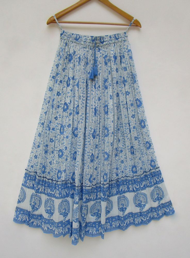 "ITEM DESCRIPTION clouds sky blue flower look beach wear women printed maxi skirts - broomstick style ethnic wear maxi skirts Material: 100% cotton cambric soft crinkled fabric Length: - 38 inch long Waist :-28.00 inch full (14 inch half) 28 inch relaxed can stretch up to 50 inch Size: free size (fit to all) PRODUCT NAME: - Long Women Maxi skirts Ladies Vintage Long skirts Company Return Policy: Please write for more information to my email directly CHOOSE \"ASK SELLER QUESTION \" payment policy Affordable Summer Maxi Skirt For Beach, Cheap Beach Floral Print Maxi Skirt, Cheap Relaxed Maxi Skirt For Beach, Casual Beach Skirt Affordable, Cheap Casual Maxi Skirt For Beach, Cheap Relaxed Fit Maxi Skirt For Beach, Cheap Summer Skirt For Beach Season, Luxury Blue Skirt For Beach, Affordable Light Blue Beach Skirt