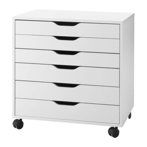 a white dresser with five drawers on wheels and black handles, in front of a white background