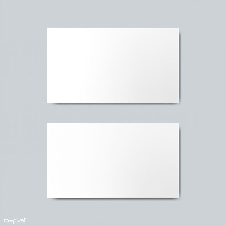 two blank white business cards on a gray background