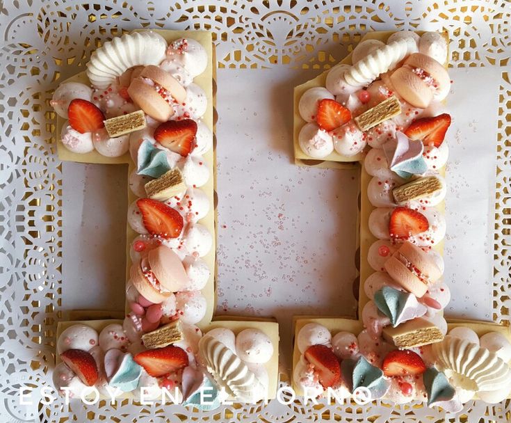 the letter f is made up of cookies and strawberries on top of each other