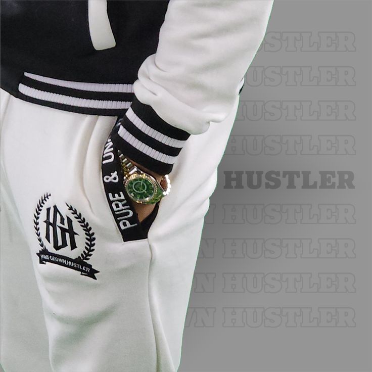 Stay comfortable and stylish with the Home Grown Hustler varsity set. This set includes a varsity jacket and matching jogger pants, both made from a soft and stretchy fabric. The relaxed fit allows for maximum mobility, while the bold logo adds a touch of flair. Whether you're running errands, meeting up with friends, or just lounging at home, this varsity set is a perfect choice. Plus, it's easy to care for – just toss it in the wash and it's good as new. Available in sizes S-XXXL, this varsity White Letter Print Sweatpants For Winter, Winter White Sweatpants With Letter Print, White Sweats For College In Winter, White Winter Sweats For College, White Hip Hop Sweatpants With Letter Print, Casual Cotton Joggers With Three Stripes Branding, Casual Joggers With Three Stripes Branding For Loungewear, White Athleisure Tracksuit For Sports Season, White Letter Print Sweatpants For Streetwear