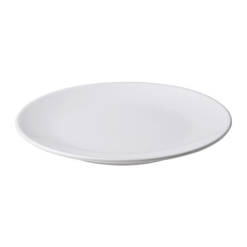 an empty white plate on a white background