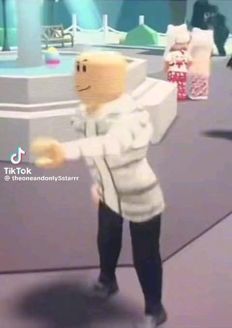 an animated image of a man in a white jacket and black boots holding a wii controller