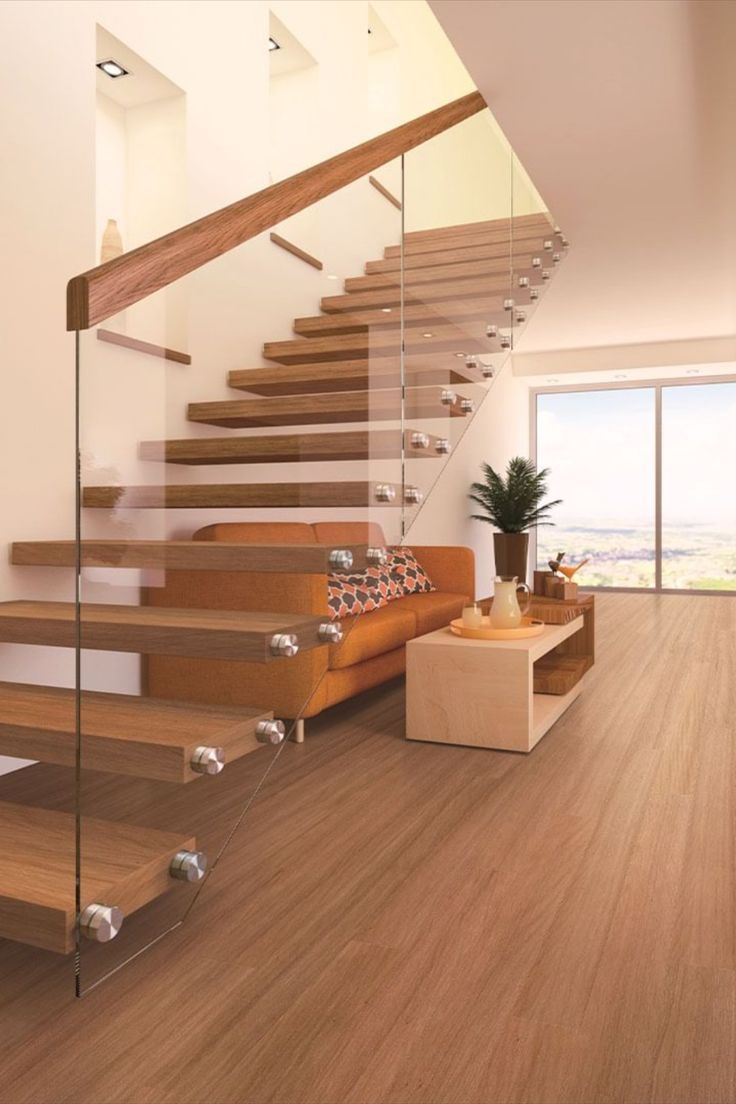 Floating floorboards installed in a living area, also featuring large sliding glass doors and a modern staircase. Floating Floorboards, Floor Boards, Edge Profile, Renovation Inspiration, Engineered Flooring, Blue Space, Tongue And Groove, Timber Flooring, Tile Samples