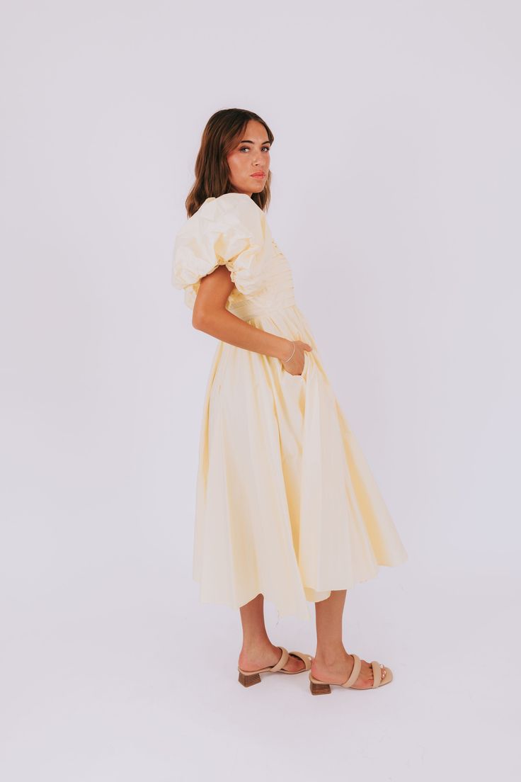 Have a slice of sweet style with our Lemon Meringue Dress! This dress will make you feel like a summer treat with its puffy sleeves, pleated bust, and square neckline. Perfect for sunny days and fun nights! Details Puffy sleeves Pleated bust Square neckline Lined to the knee Sizing Approximate measurements: SIZE LENGTH BUST Small 46" 36" Medium 47" 38" Large 50" 40" Fabric has no stretchModel is 5’8 wearing small Material Self 100% CottonLining 100% PolyesterHand wash coldHang to dry Lemon Meringue, Summer Treats, Puffy Sleeves, Sweet Style, Square Necklines, Meringue, Square Neckline, Sunny Days, Make You Feel