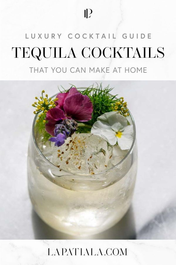 a glass filled with ice and flowers on top of a white countertop next to the words luxury cocktail guide tequila cocktails that you can make at home