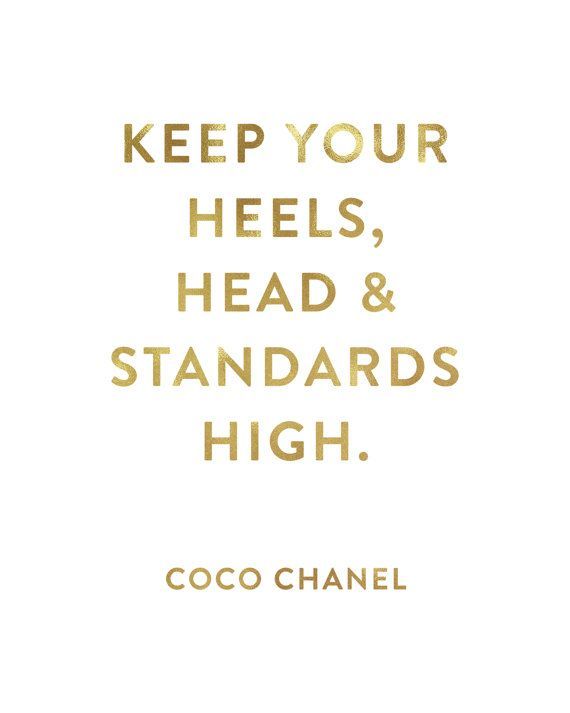 the words keep your heels, head and standards high are shown in gold on a white background