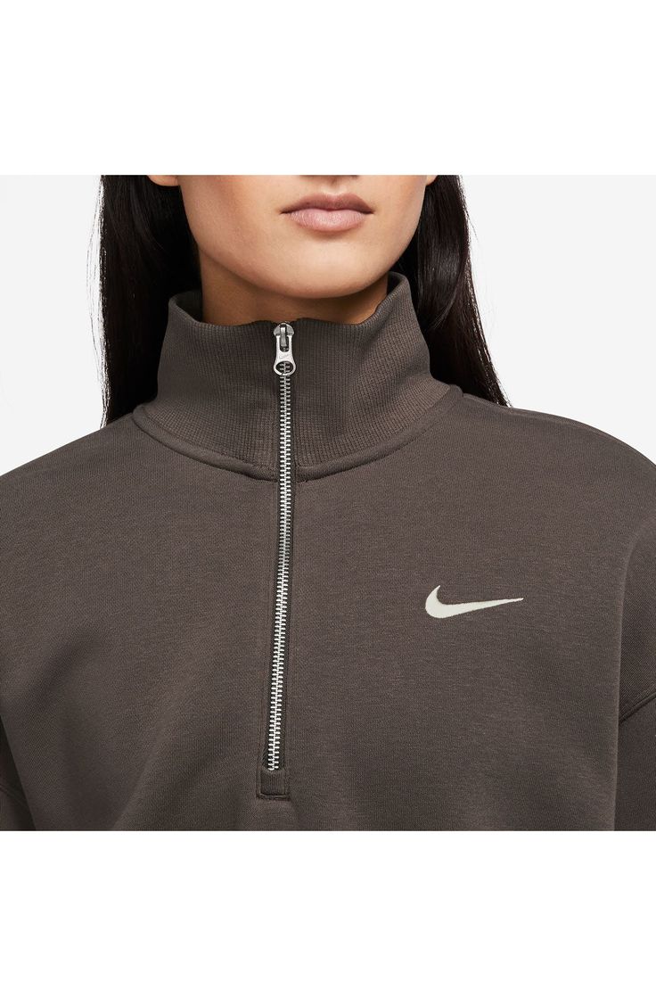 A roomy fit and cropped hem define this cozy half-zip sweatshirt with a brushed-fleece interior that's perfect for chillier days. 19" length (size Medium) Half-zip closure Stand collar Ribbed cuffs 80% cotton, 20% polyester Machine wash, tumble dry Imported Nordstrom x Nike: A curated lifestyle destination where fashion is the ultimate sport Nike Fleece Half-zip Sweatshirt, Nike Half-zip Fleece Sweatshirt, Nike Half-zip Sportswear Top, Sporty Funnel Neck Sweatshirt, Half-zip Sportswear Sweatshirt For Fall, Nike Half-zip Top For Fall, Sports Half-zip Sweatshirt, Sportswear Fleece Half-zip Top, Sporty Fleece Half-zip Sweatshirt