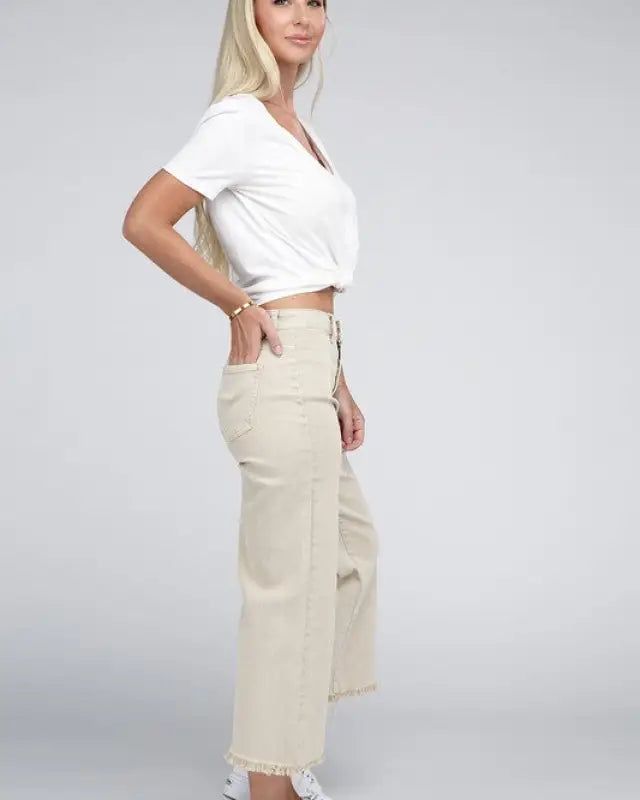 Elevate your denim game with our Acid Washed High Waist Frayed Hem Straight Pants. The high waist design not only adds a trendy touch but also ensures a flattering fit. Crafted from denim with a good stretch, they provide exceptional comfort for all-day wear. The zip fly and back pockets offer both functionality and fashion, making these pants a practical choice for any occasion. With their frayed hem and straight wide leg, these pants are a must-have addition to your wardrobe, delivering a mode High Waist Cotton Jeans, Non-stretch Wide Leg Cropped Jeans, Trendy High Waist Pants With Five Pockets, Trendy High Waist Cropped Jeans, Trendy Non-stretch Mid-rise Cropped Jeans, Trendy Relaxed Fit High Rise Pants, Trendy Non-stretch High Rise Cropped Jeans, Trendy High Waist Relaxed Fit Cropped Jeans, Trendy High Waist Wide Leg Pants With Five Pockets