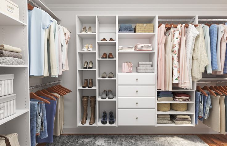 an organized closet with clothes and shoes