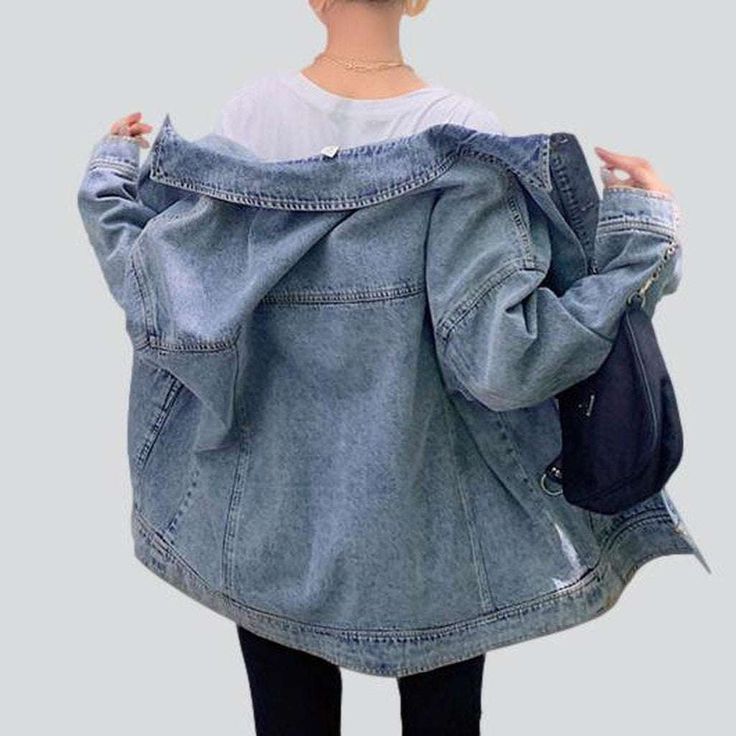 Bring a touch of nostalgia to your wardrobe with our 2023 Spring-Summer Collection's Bleached Roomy Women's Denim Jacket a unique blend of city-trend and Millennium-inspired fashion!Why You'll Fall In LoveMake a statement with this stylish piece of urban. Crafted for the couture fashionista. this jacket boasts an oversized silhouette that ensures maximum comfort and freedom of movement. Its bleached finish and intricate painted prints create a unique texture. while its buttoned closure and suspe Oversized Hooded Denim Jacket In Medium Wash, Oversized Hooded Medium Wash Denim Jacket, Oversized Hooded Denim Jacket, Trendy Oversized Hooded Denim Jacket, Trendy Washed Hooded Denim Jacket, Trendy Hooded Denim Jacket In Blue, Trendy Hooded Denim Jacket With Pockets, Casual Hooded Denim Jacket For Spring, Hooded Denim Jacket With Pockets For Spring