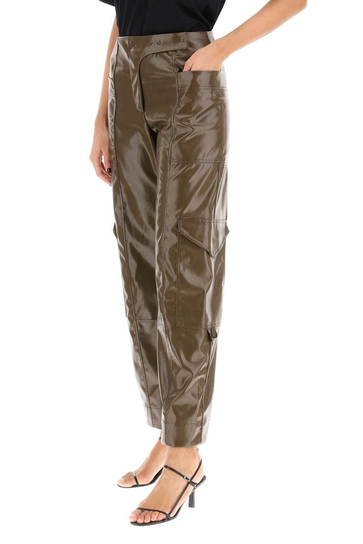 Ganni cargo-style pants made of panelled shiny faux leather with a high-rise loose fit without waistbelt. They feature large patch pockets at the hips, two cargo pockets and front closure with zip fly and snap tab. The model is 177 cm tall and wears a size EU 34. Size Info STANDARD Color Detail Brown Made In China Material 50% PL 50% PU Season One spring Season Two summer Product clothing Brand Ganni Size And Fit Leather Cargo Pants, Cargo Pants Sale, Trench Dress, Latest Fashion Design, Cargo Style, Moon Boots, Cape Coat, Style Pants, Pant Shirt