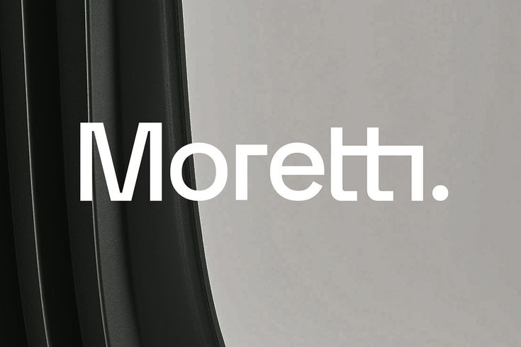 the word moretti is written in white on a black and gray background with curved lines