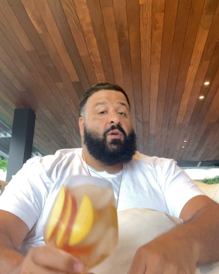 a man sitting at a table with food in front of him