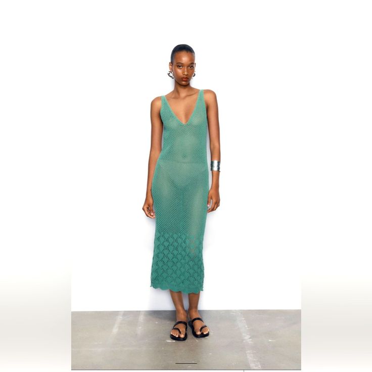 V-Neck Midi Dress With Wide Straps. Perforated Fabric Detail. Scalloped Trim. Green V-neck Midi Dress For Beach, Fitted V-neck Dress For Summer Daywear, V-neck Midi Dress For Beach Daywear, V-neck Midi Dress For Beach Party, Green Midi-length V-neck Summer Dress, Green Midi V-neck Dress For Summer, Chic Green V-neck Dress For Day Out, Summer Fitted V-neck Dress For Daywear, V-neck Midi Dress For Day Out Beachwear