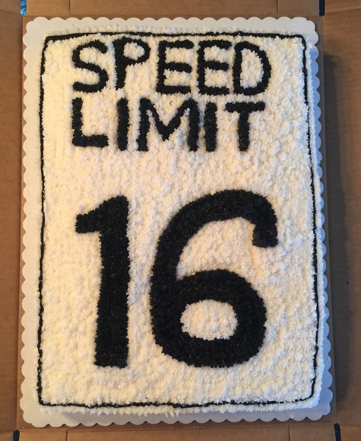 a cake with the number sixteen on it is decorated like a speed limit 16 sign