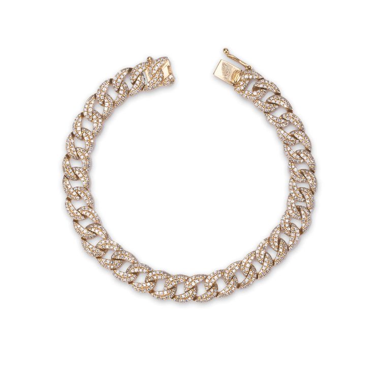 Our favorite signature piece with beautiful micro-pave diamonds covering the entire surface of the tightly woven Cuban link bracelet. A nearly invisible setting covered with diamonds makes the bracelet a complete 360 degrees of diamond luster. The unique and timeless design of our signature bracelet allows the confident woman to expresses her femininity. 14K gold 2.98 ct diamonds for 7 inch length and up (ct diamonds vary upon length) 23.56 grams gold (7 inch length, varies upon length) 1444 plus white diamonds, micro-pave (7 inch length, varies upon length) G/H color diamonds Secure insert clasp for comfort and loop safety, diamonds continuous on clasp Available in Yellow Gold, Rose Gold and White Gold Made with love in Los Angeles Complimentary gift wrapping provided Luxury Diamond White Bracelets With Rhinestones, Luxury White Gold Bracelets With Rhinestones, Luxury White Gold Bracelet With Rhinestones, Luxury Iced-out Cubic Zirconia Chain Bracelet, Luxury Diamond Curb Chain Bracelets, Elegant Diamond Bracelet With Cuban Link, Luxury Cubic Zirconia Bracelet With Curb Chain, Luxury Curb Chain Bracelet With Cubic Zirconia, Elegant Iced Out Cuban Link Tennis Bracelet