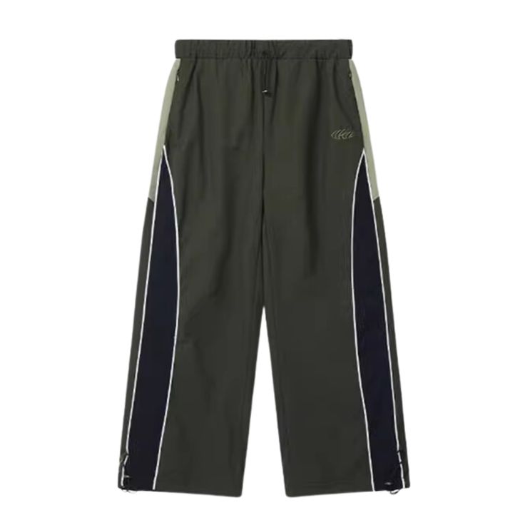 These Paneled Stripe Contrast Baggy Sweatpants provide a relaxed fit for maximum comfort throughout your day. Crafted with a premium cotton blend and a modern paneled striped design, they're ideal for both casual and active wear. Enjoy superior durability and long-lasting wear. Features: -100% Polyester -Mid-rise Waist -Drawstring Waistband -Patchwork Design -Baggy Fit -Unisex Sports Style Green Side Stripe Pants For Streetwear, Green Pants With Side Stripes For Streetwear, Green Streetwear Pants With Side Stripes, Striped Cotton Pants For Streetwear, Green Sweatpants With Side Stripes For Streetwear, Casual Streetwear Bottoms With Signature Stripes, Casual Bottoms With Signature Stripes For Streetwear, Relaxed Fit Sweatpants With Contrast Stripes For Streetwear, Casual Cotton Bottoms With Signature Stripes