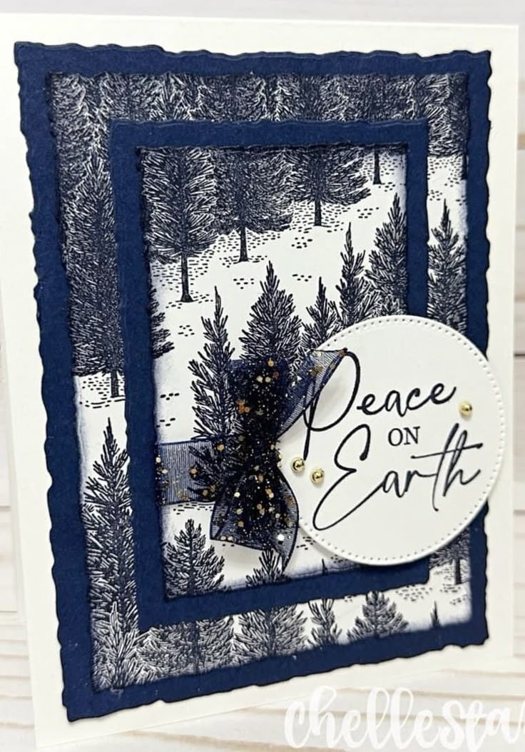 a handmade christmas card with the words peace on earth written in black and white