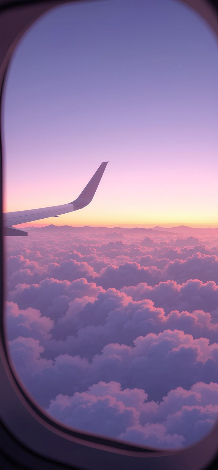 an airplane window looking out at the clouds