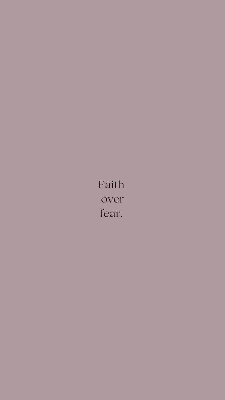 the words faith over fear are in black and white on a pale pink background,