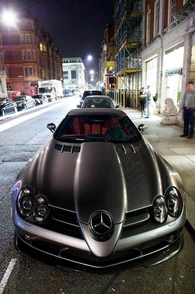 a car parked on the street at night