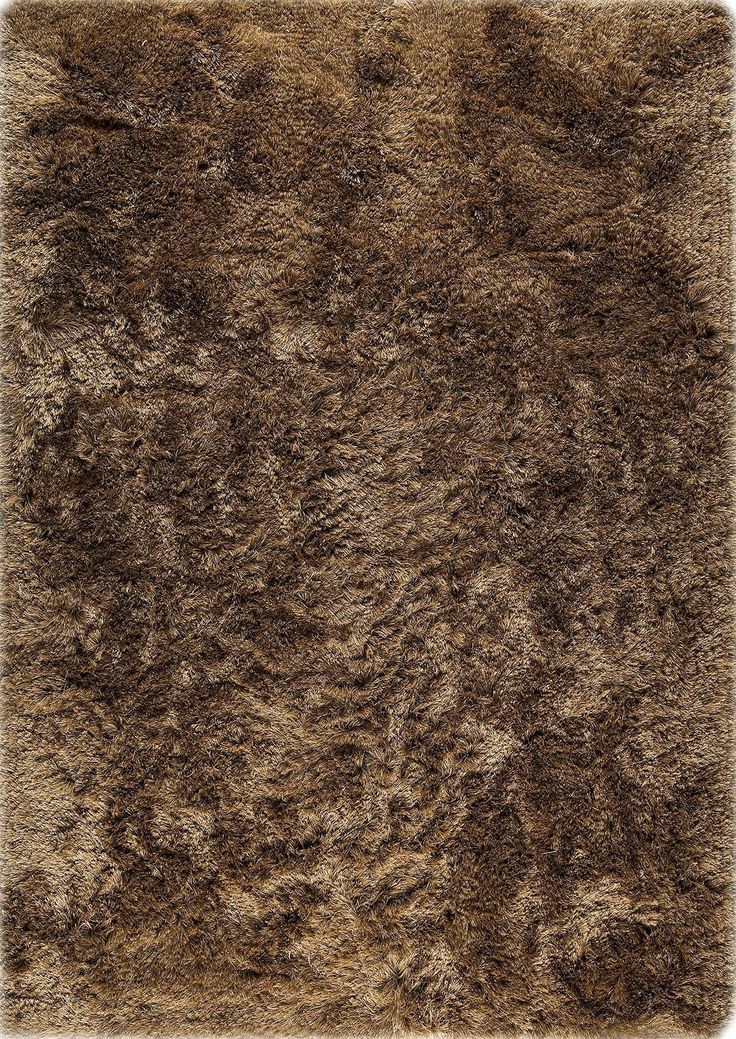 a brown area rug that is very shaggy