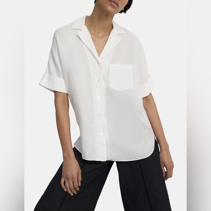 Crafted From Premium Linen That's Garment-Dyed For Added Softness And Comfort, This Relaxed, Laid-Back Style Works For An Infinite Number Of Occasions. Classic Shirt With Roll-up Sleeves For Day Out, Classic Shirt With Rolled Sleeves For Day Out, Casual Short Sleeve Blouse With Cuffed Sleeves, Relaxed Fit Office Top With Placket, Casual Blouse With Cuffed Short Sleeves, Classic Summer Blouse With Roll-up Sleeves, Classic Tops With Rolled Sleeves For Day Out, White Short Sleeve Top With Button Cuffs, Classic Shirt With Spread Collar For Day Out