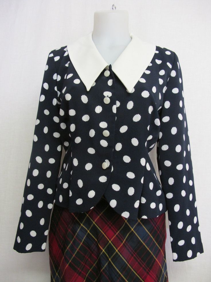 "Liz Claiborne Peplum Blouse ~Sassy~ Polka Dot Blouse ~This is a WOW~ Beautifully tailored and fitted Poly crepe A bit dress up! Button front Peplum waist Shoulder pads have been removed Small 4 Petite Bust 38\" Waist 30\" Hip 40\" Shoulder 16\" Length 19\" Excellent condition Looks unworn! https://www.etsy.com/shop/BelindasStyleShop" Fitted Long Sleeve Polka Dot Blouse, Chic Fitted Blouse With Peter Pan Collar, Classic Fitted Polka Dot Blouse, Vintage Tops With Peter Pan Collar For Office, Classic Fitted Blouse With Peter Pan Collar, Classic Fitted Polka Dot Tops, Classic Fitted Top With Peter Pan Collar, Fitted Retro Blouse With Peter Pan Collar, Retro Fitted Blouse With Peter Pan Collar