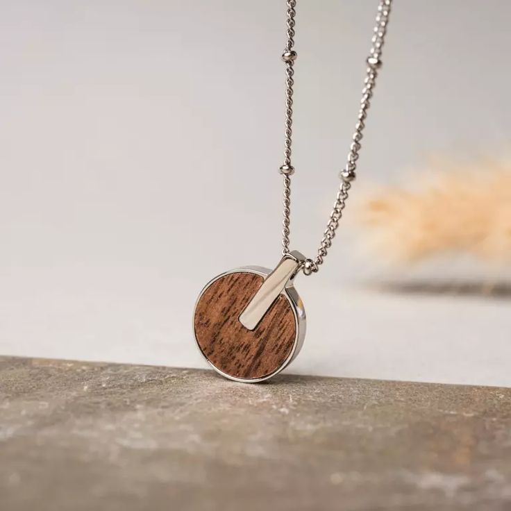 Opacity Necklace (Walnut/Silver) | Holzkern Trendy Adjustable Circle Jewelry, Modern Circle Stainless Steel Jewelry, Everyday Adjustable Circular Necklaces, Adjustable Circle Necklaces For Everyday, Brown Resizable Jewelry For Gifts, Trendy Round Jewelry As Gift, Trendy Round Jewelry For Gift, Trendy Round Jewelry For Gifts, Everyday Silver Jewelry With Adjustable Length