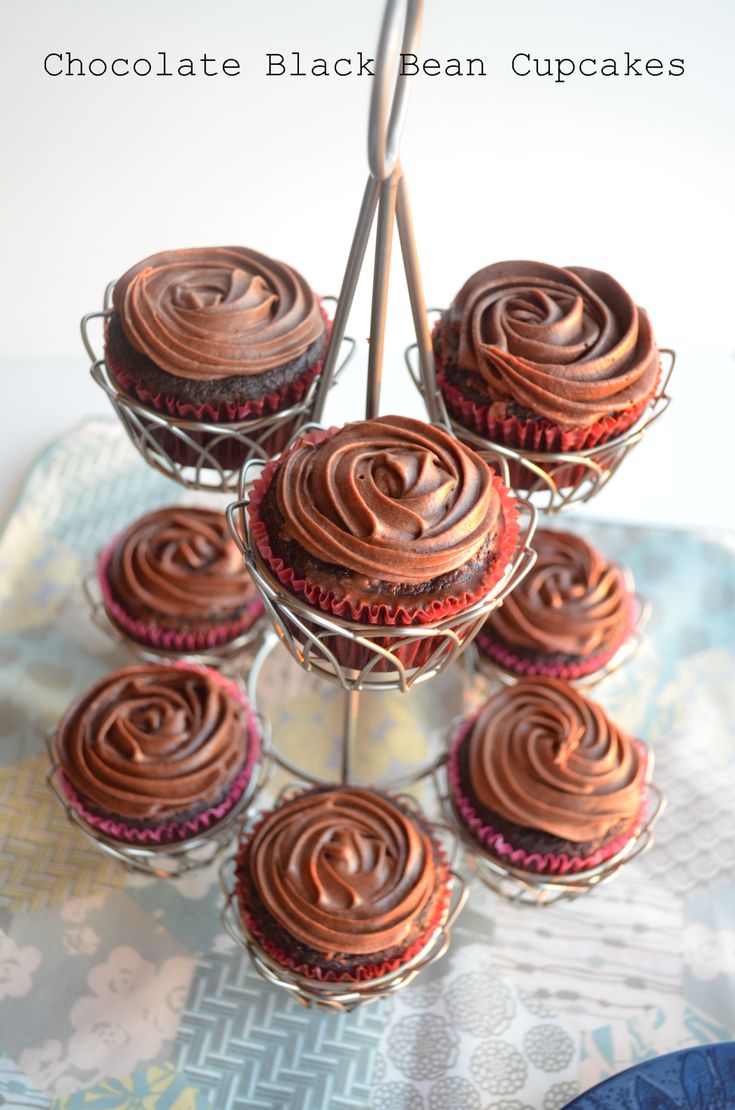 chocolate black bean cupcakes on a cake stand