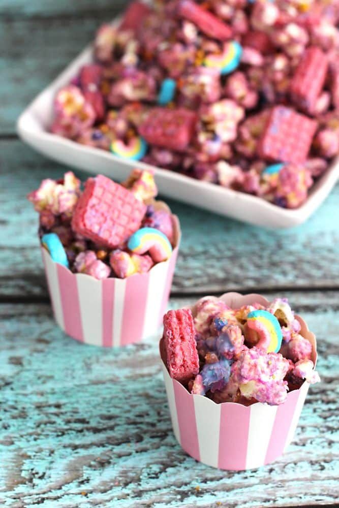 pink and white striped cups filled with cereal