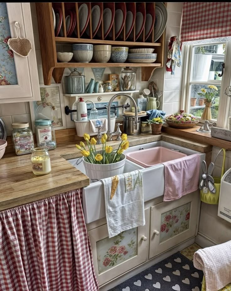 the kitchen is clean and ready to be used for cooking or baking, as well as dishes